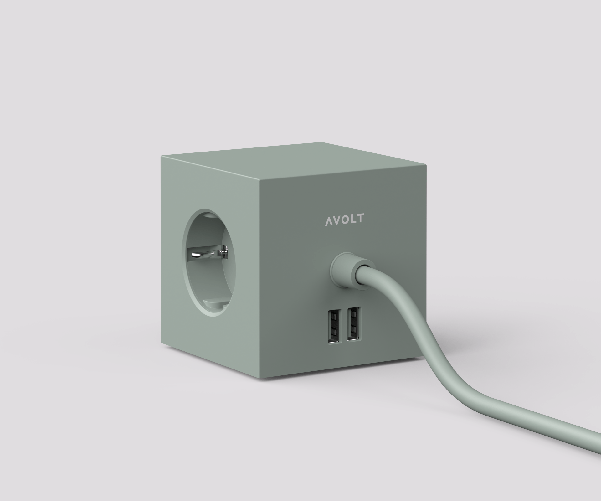Ein grauer Würfel mit zwei USB-Anschlüssen und einem daran befestigten Kabel.