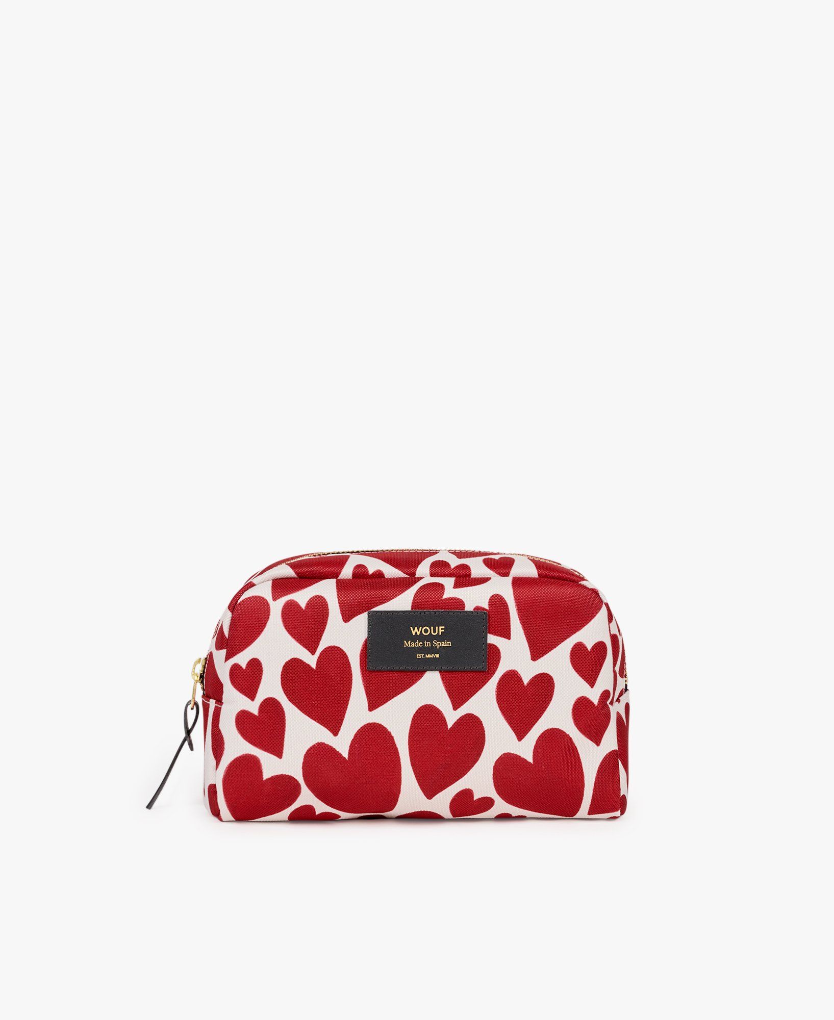 Eine Kosmetiktasche mit roten Herzen auf weißem Hintergrund.