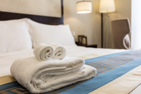 set of towels on bed
