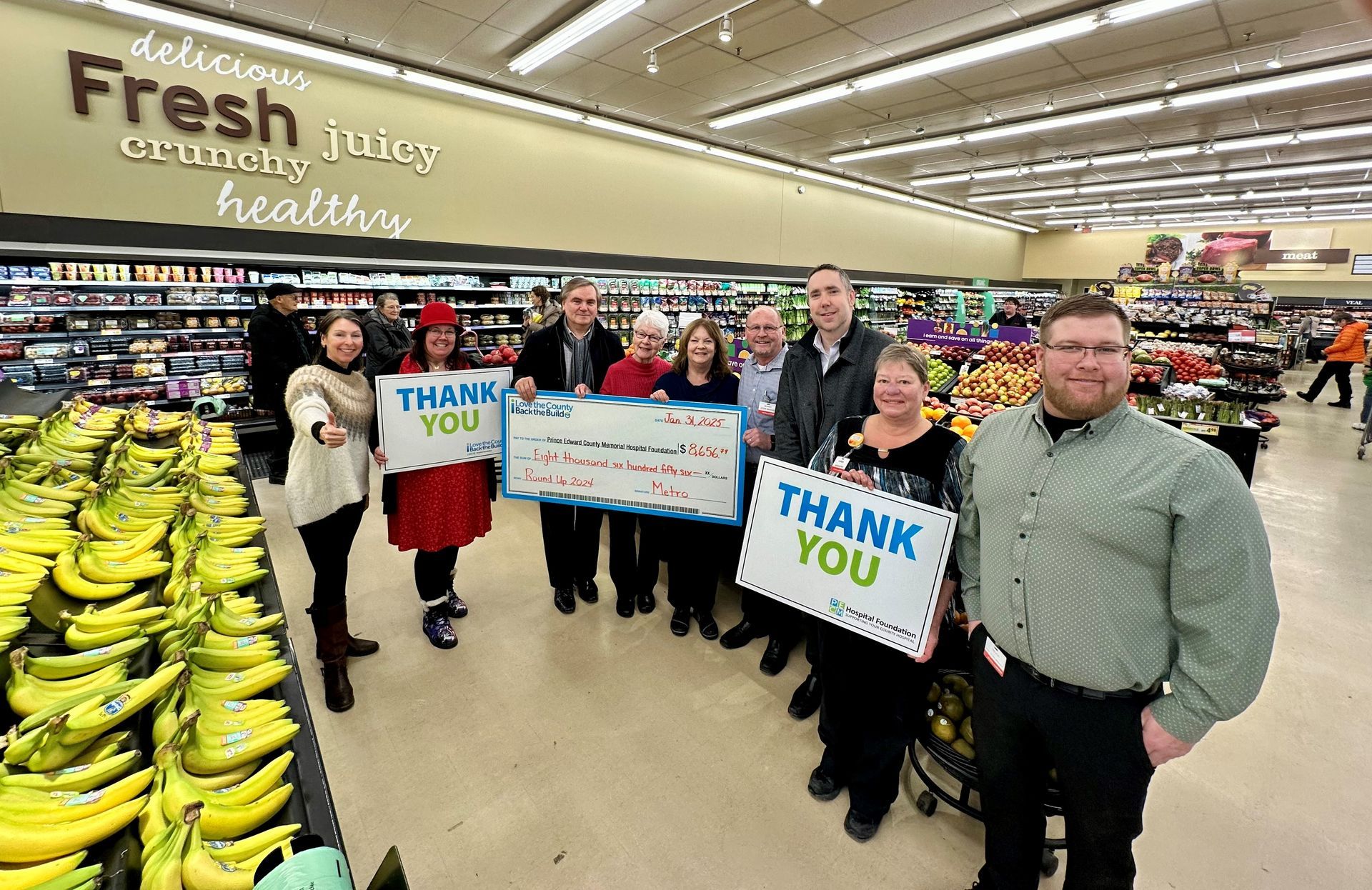 Cheque presentation photo with reps from Picton Metro.