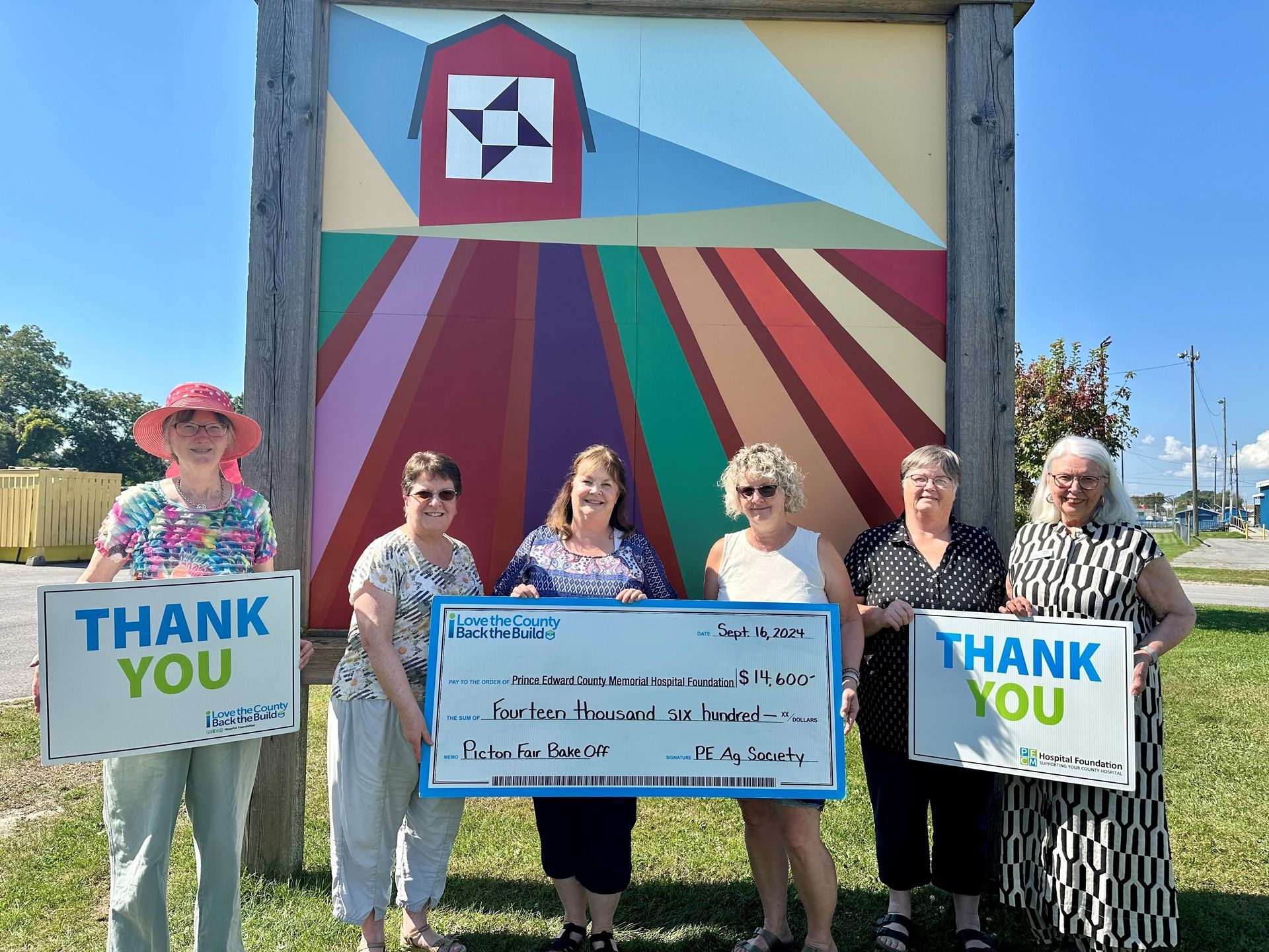 Cheque presentation photo with Ag Society.