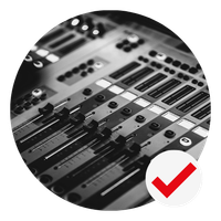 Audio mixing console, with a red check mark overlay.