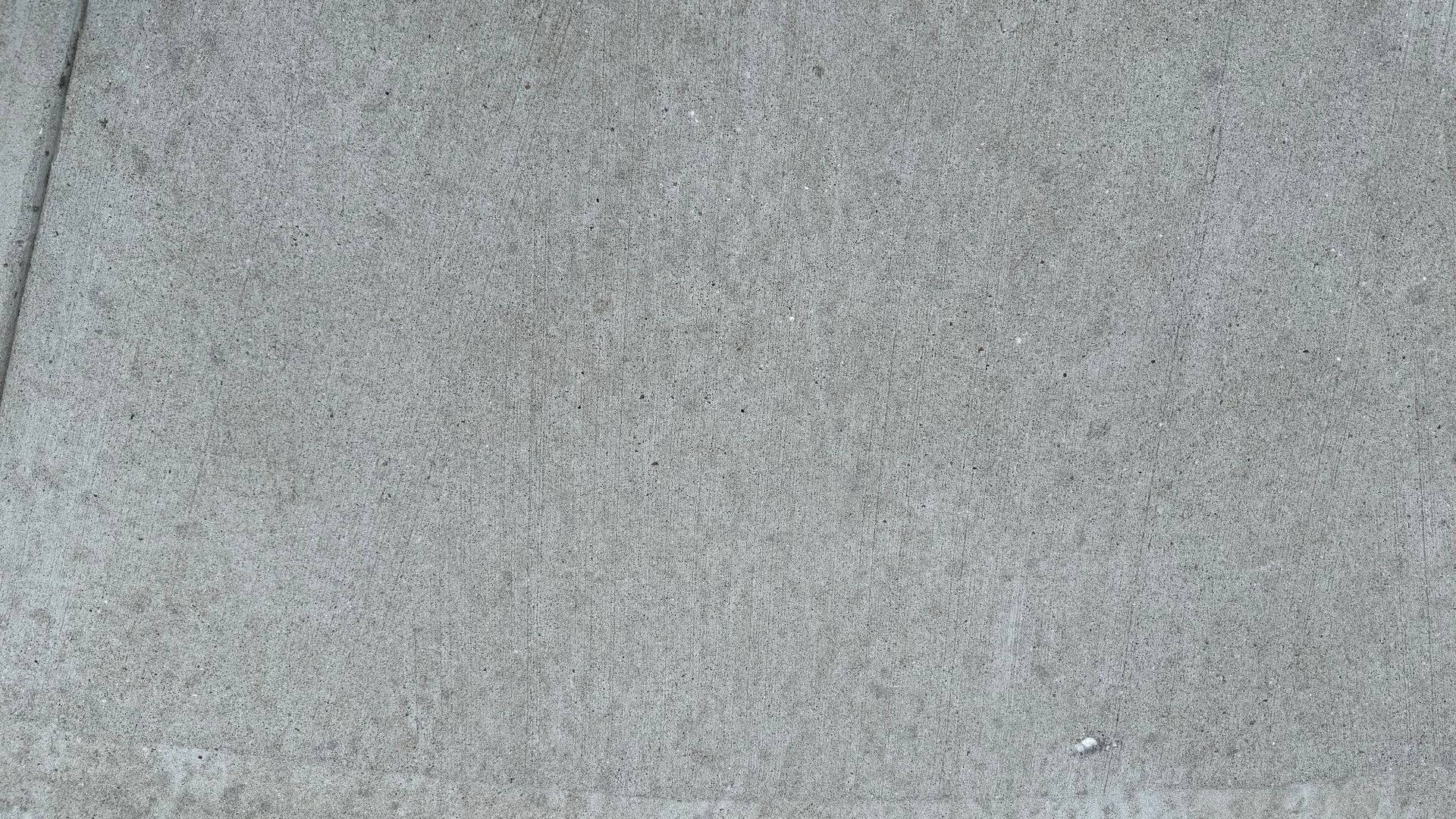 Gray concrete surface with slight texture.