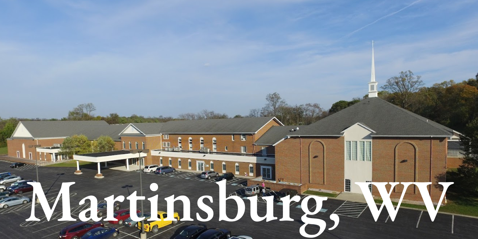 A large brick building with the words martinsburg wv written on it.