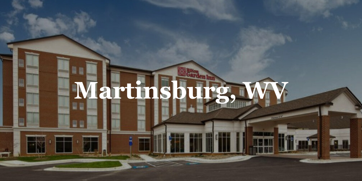 A large brick building with the words martinsburg wv written on it.