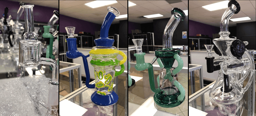 There are many different types of bongs on display in a store