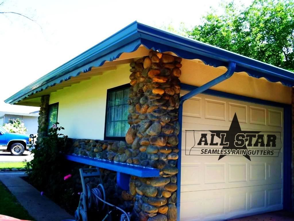 A house with a garage door that says all star
