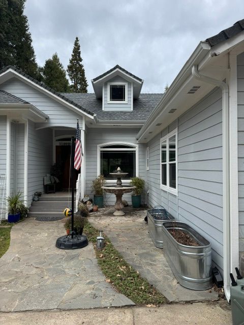 A house with a flag in front of it