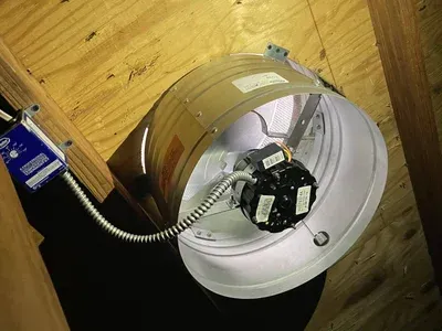 A ceiling fan with a motor attached to it