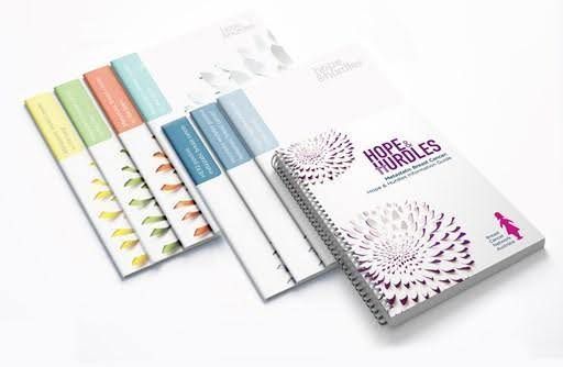 A Book Titled Hope Hurdles Is Sitting On Top Of A Stack Of Other Books — Pink Up Gold Coast in Southport, QLD