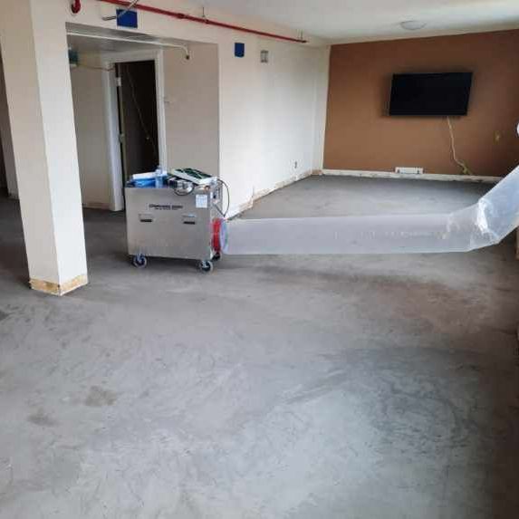 A large room with a hose coming out of it