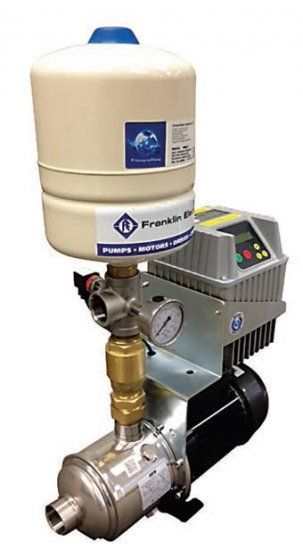 A water pump with a tank on top of it
