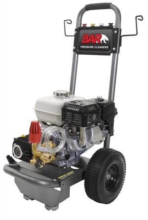 A gas powered pressure washer is sitting on a white surface.