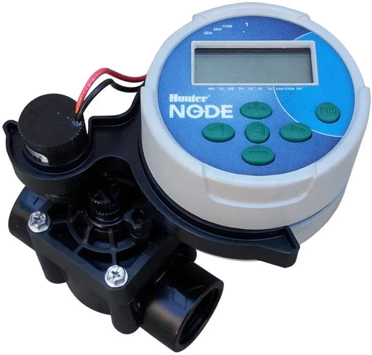 A hunter node sprinkler controller sits on a white surface