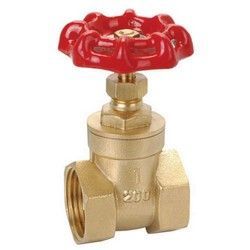 A brass gate valve with a red handle on a white background.