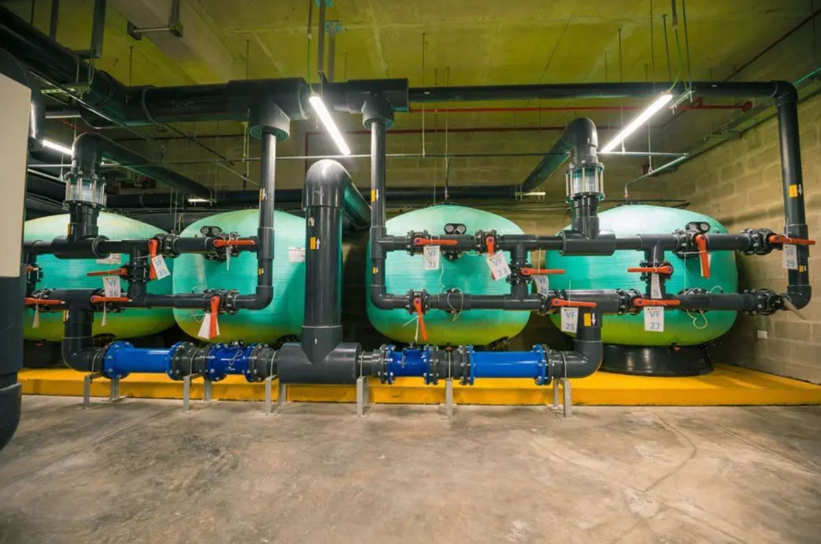 A room filled with lots of pipes and valves.