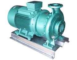 A green water pump with a motor attached to it.