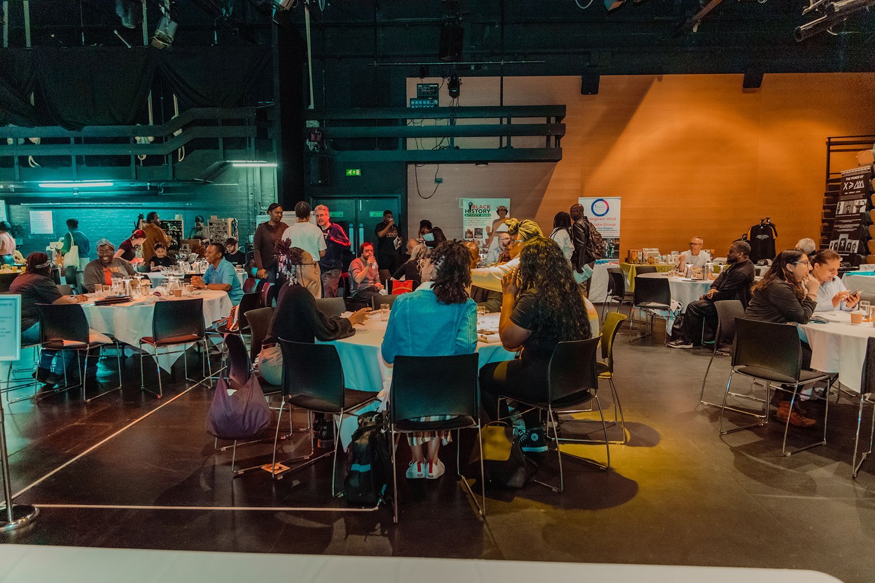 Audience listen to presentations