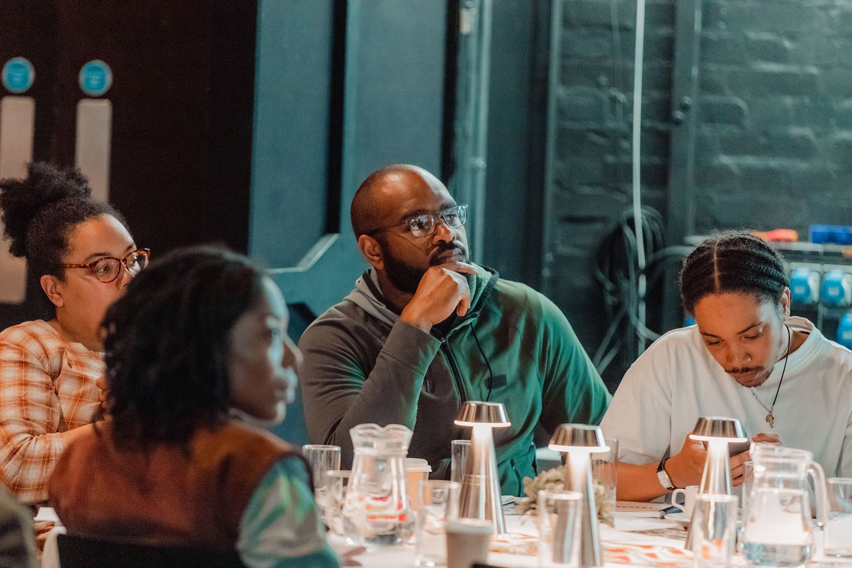 Audience listen to presentations
