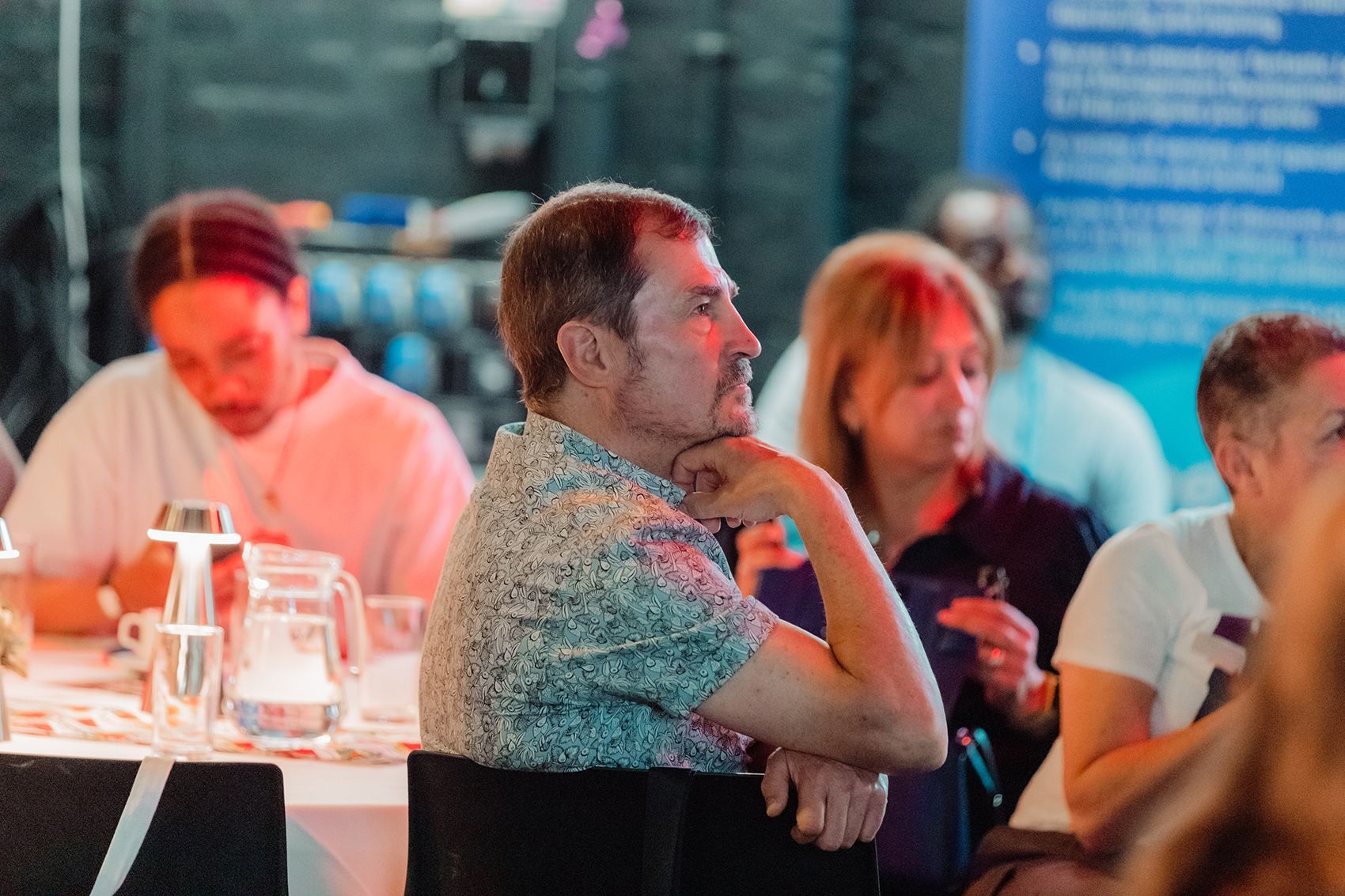 Audience listen to presentations