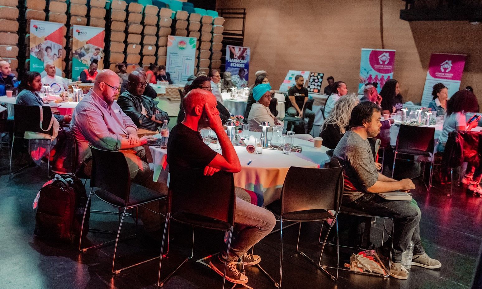 Audience listen to presentations