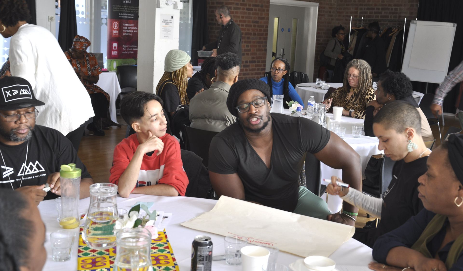 Delegates in discussions and debates