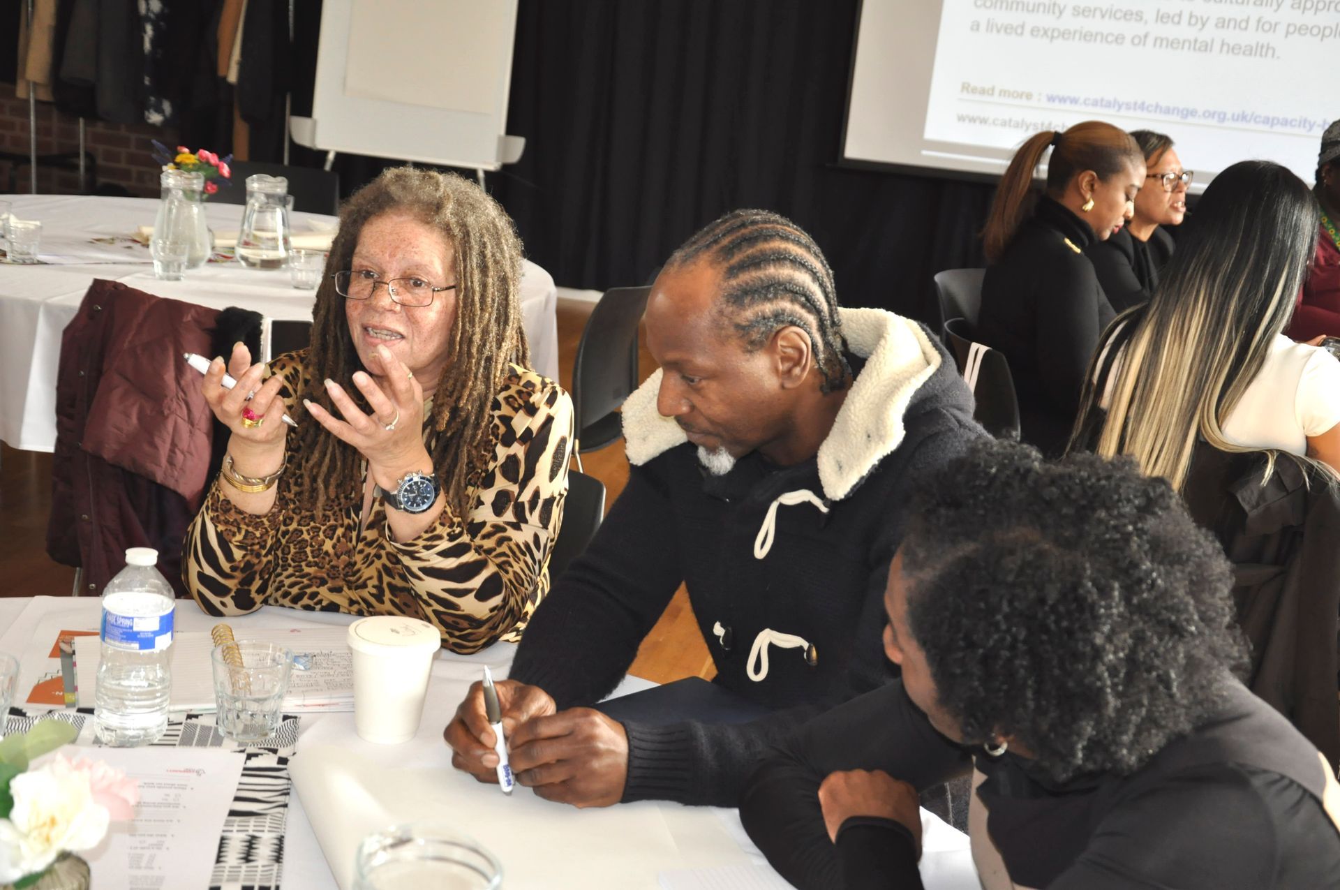 Delegates in discussions and debates