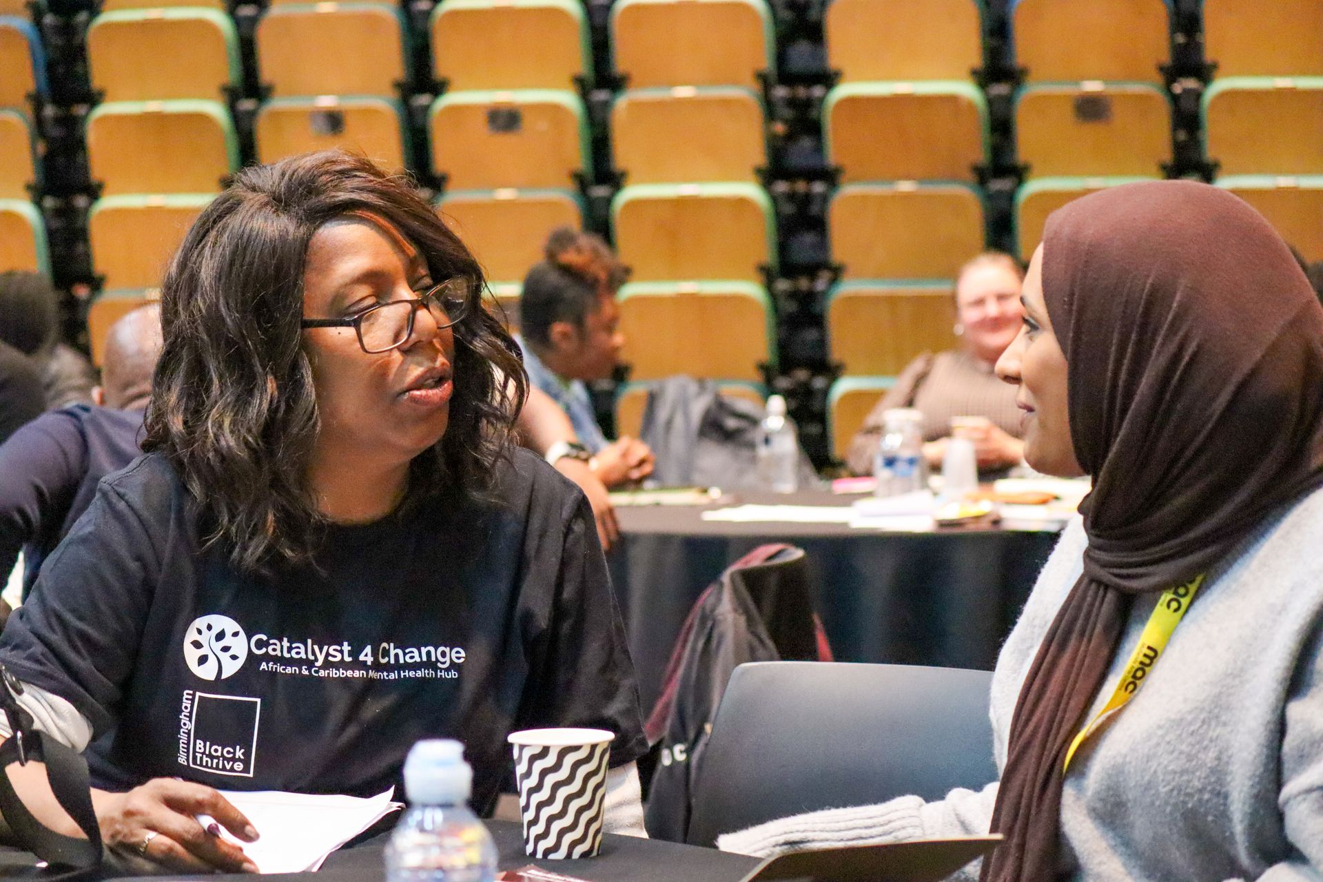 Delegates in discussions and debates