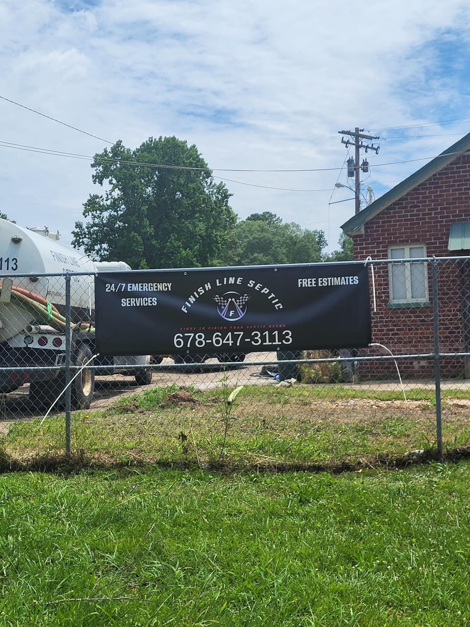 A black banner with white text advertising Septic Line Service.