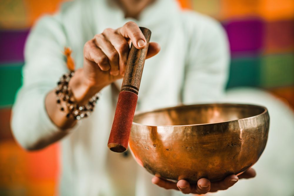 A Sound Healing Bowl with the Metal Stick — Bio-Scans, Healing, Reiki & Bowen Therapy in Kincumber, NSW