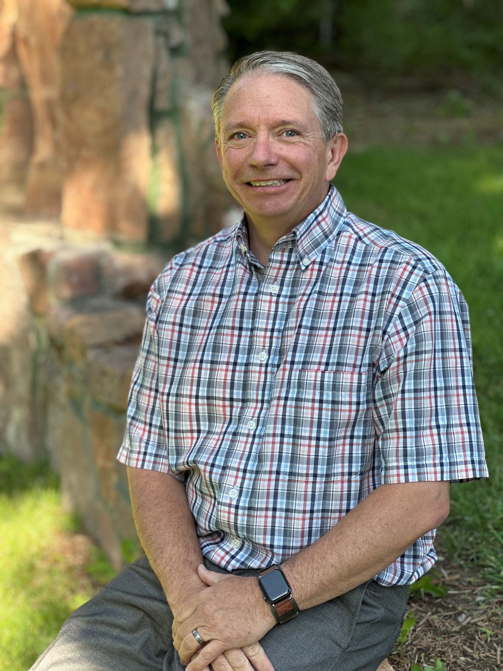 A man and a woman are posing for a picture together