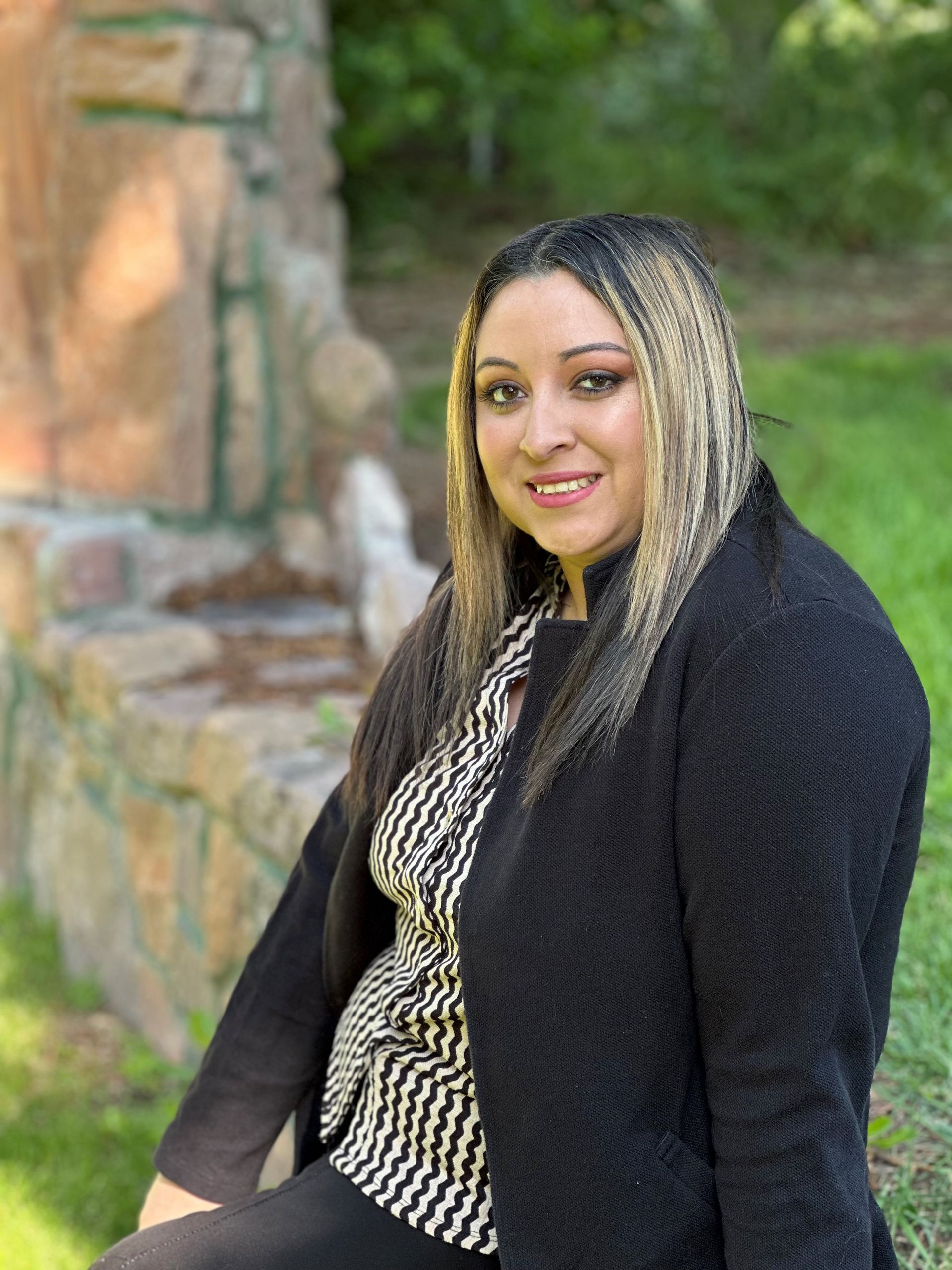 A man holding a fish is on the cover of heights living magazine