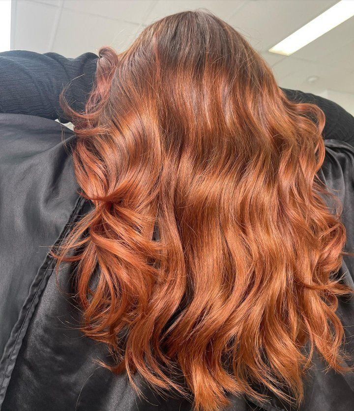 A Woman With Long Red Hair — The Hair Boutique Co In Varsity Lakes, QLD