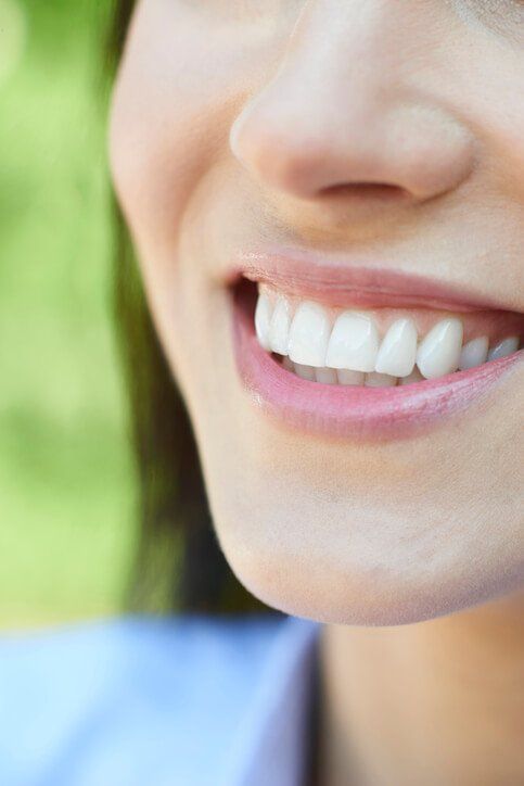 Oral Surgeon — Woman Smiling in Murfreesboro, TN
