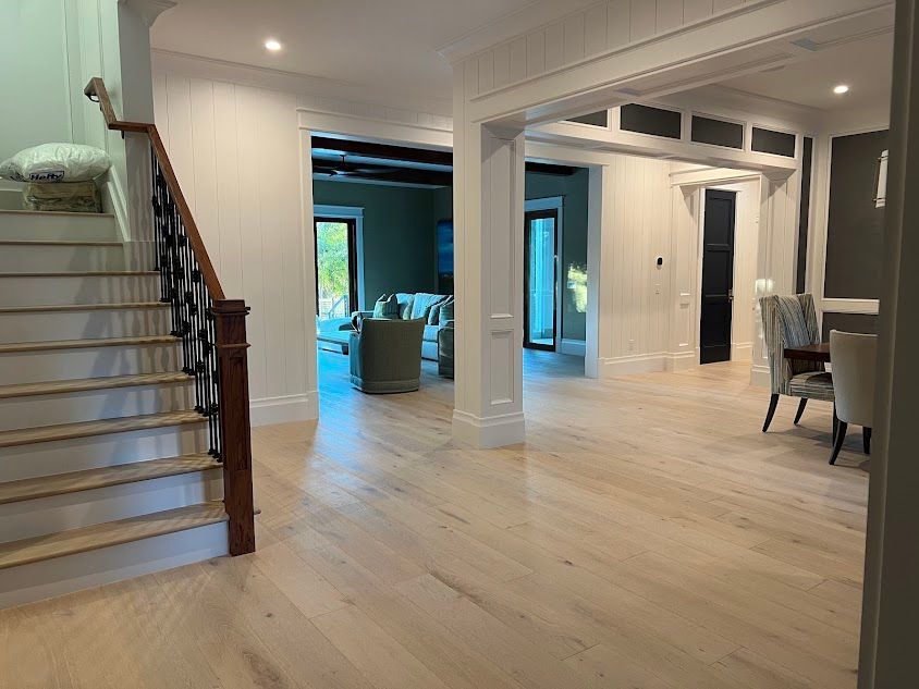 There is a staircase leading up to the second floor of a house.