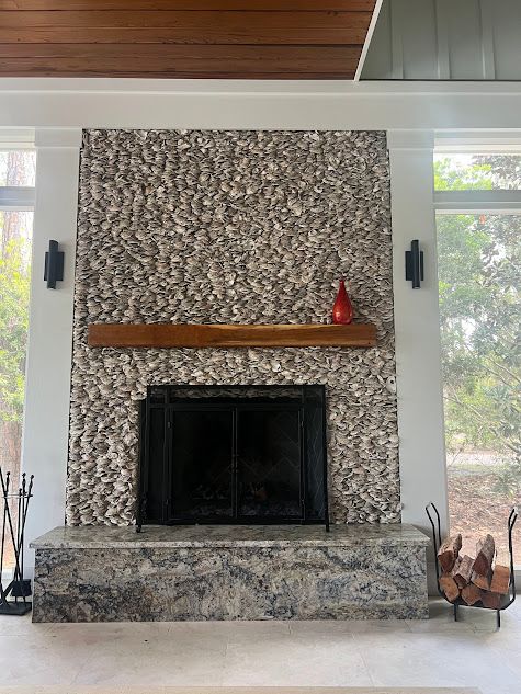 There is a fireplace in the middle of the room.