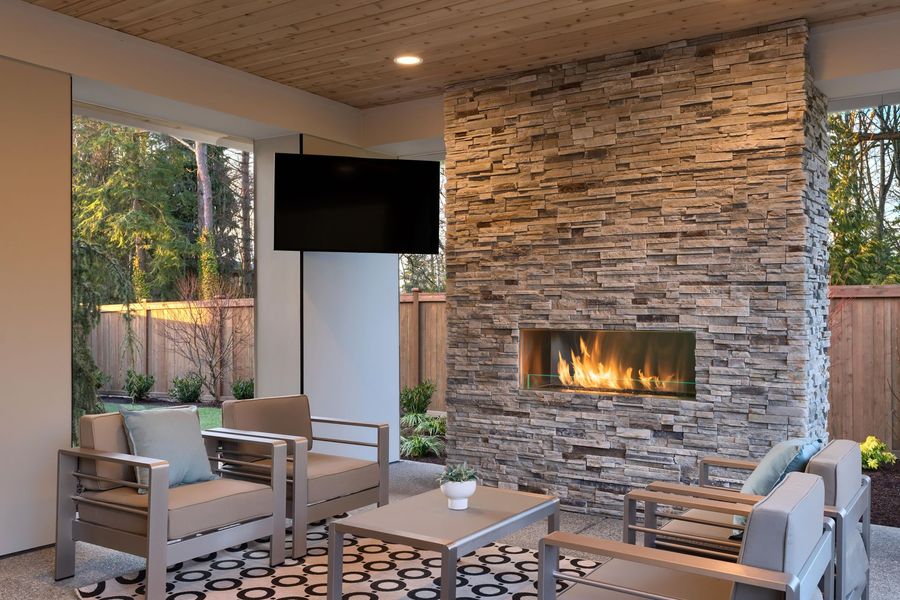 There is a fireplace in the middle of the room.