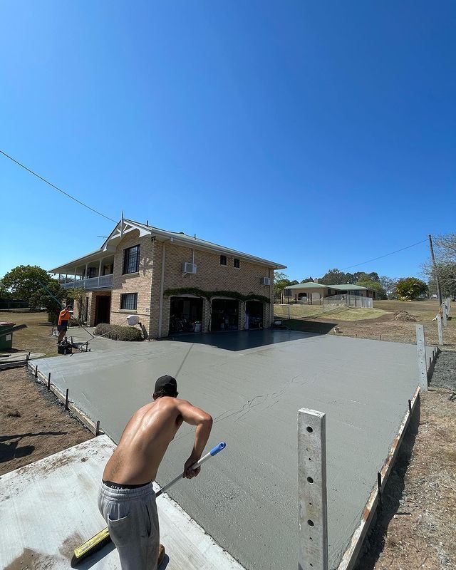 A Man Working on a Concrete Driveway — Casino, NSW — Lismore Concrete Pumping