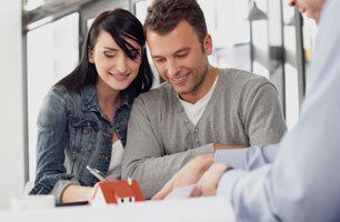 lady signing a mortgage deal