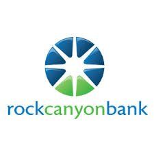 The rock canyon bank logo is a blue and green circle with a star in the middle.