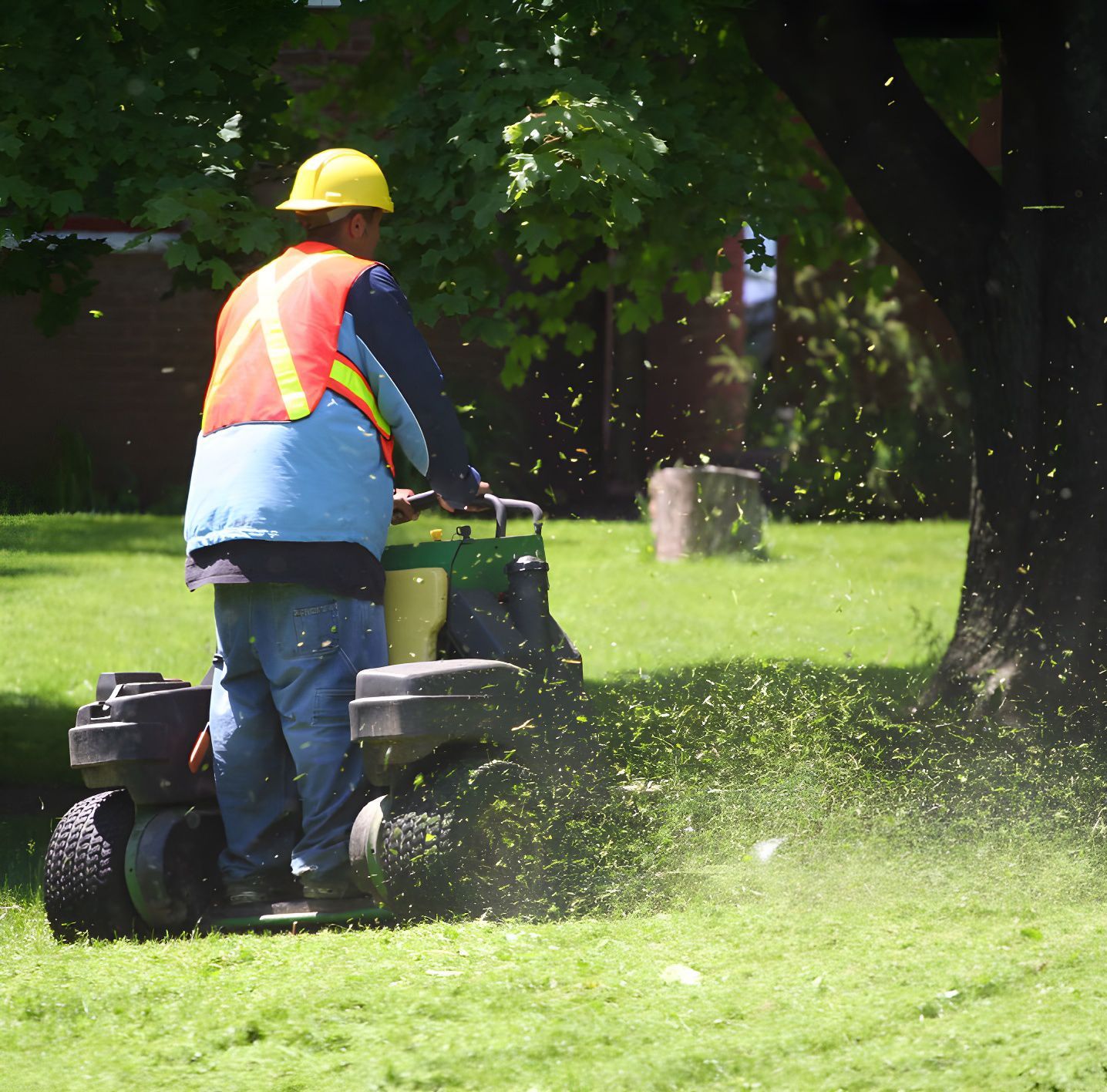 Man Driving a Lawn Mower