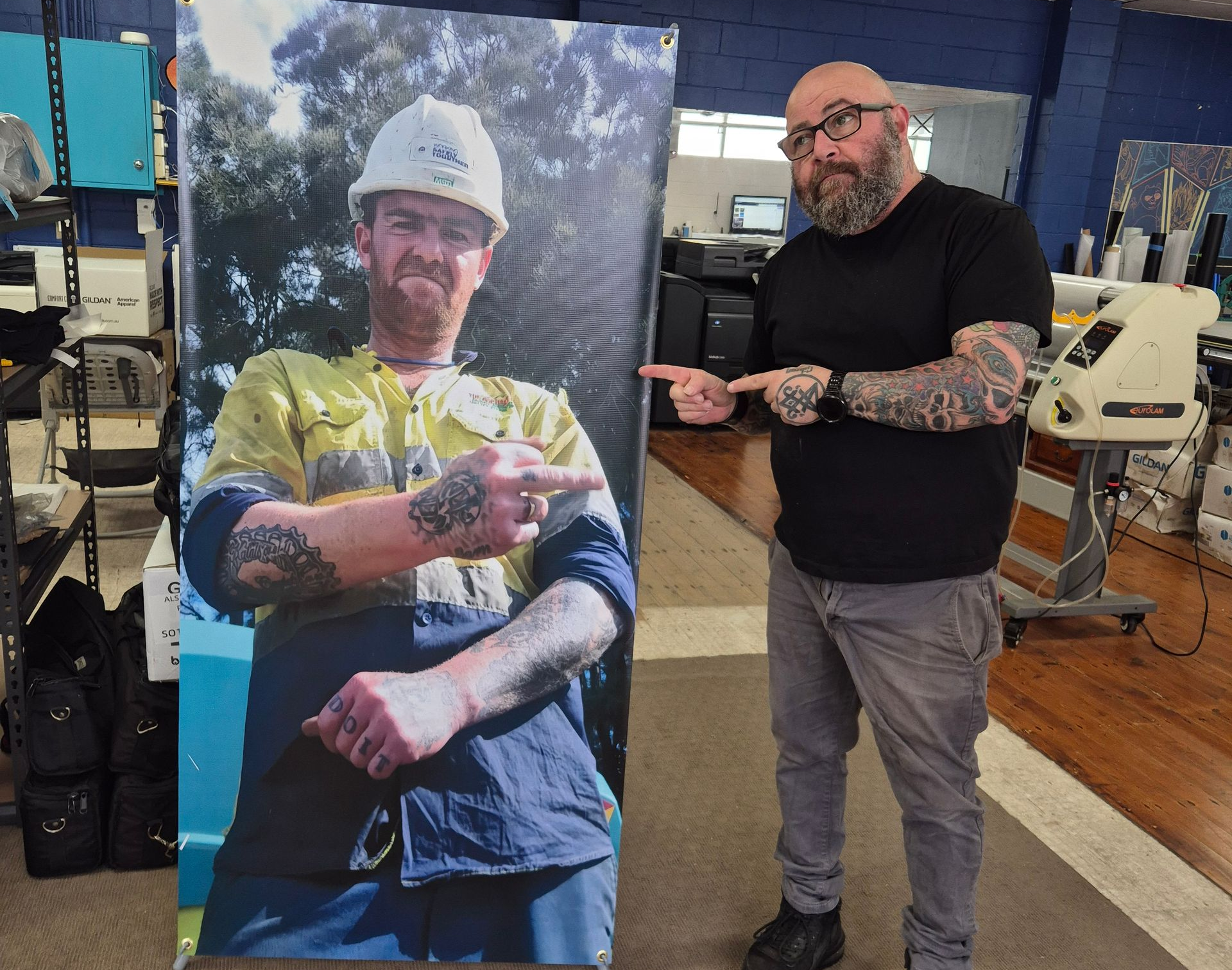 Large-format Printer Printing a Vivid Red and Orange Graphic — Al's Custom Prints in Wyong, NSW