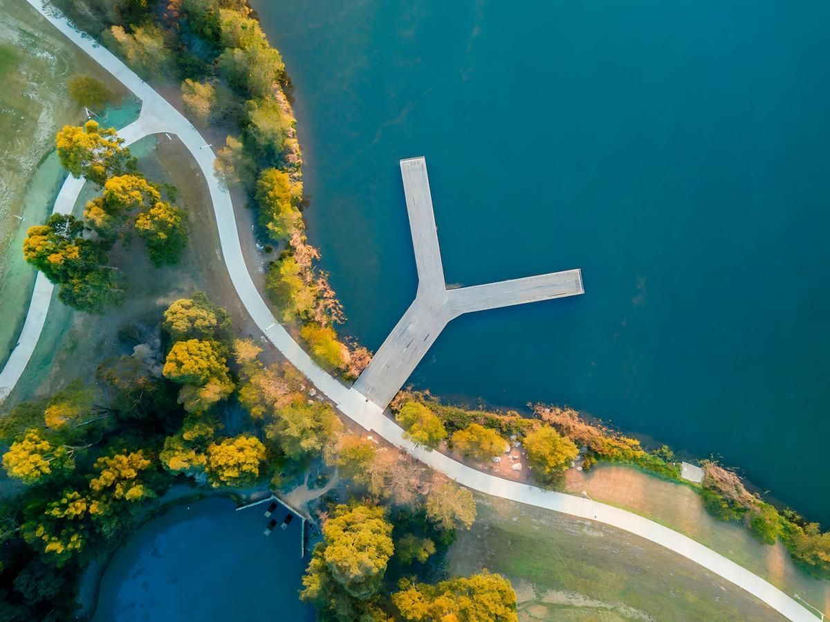 Aerial View of a Y-shaped Pier on a Lake, Surrounded by Trees and a Path — Greens Diesel Tune in Narellan, NSW