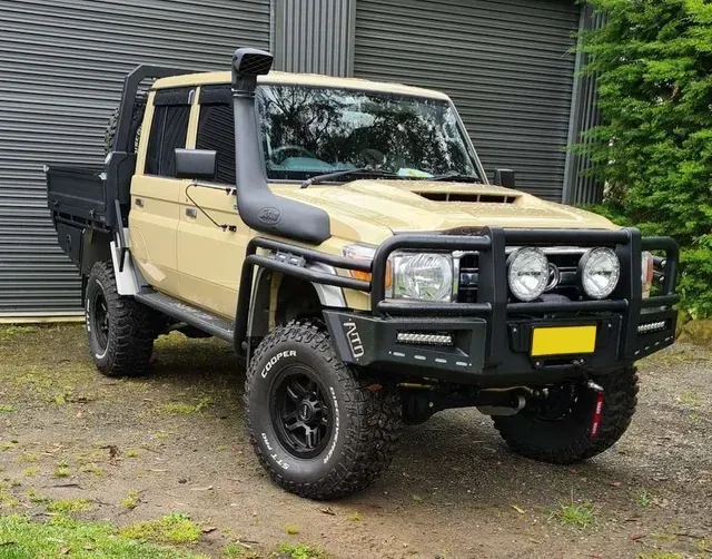 Tan Toyota Land Cruiser With Off-road Modifications — Greens Diesel Tune in Camden, NSW
