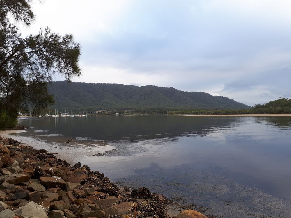 A Large Lake with a Mountain Background — Greens Diesel Tune in Camden, NSW