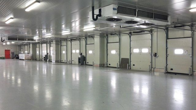 Realizzazione di porte per 3 piani di carico - Ideal System Cesena