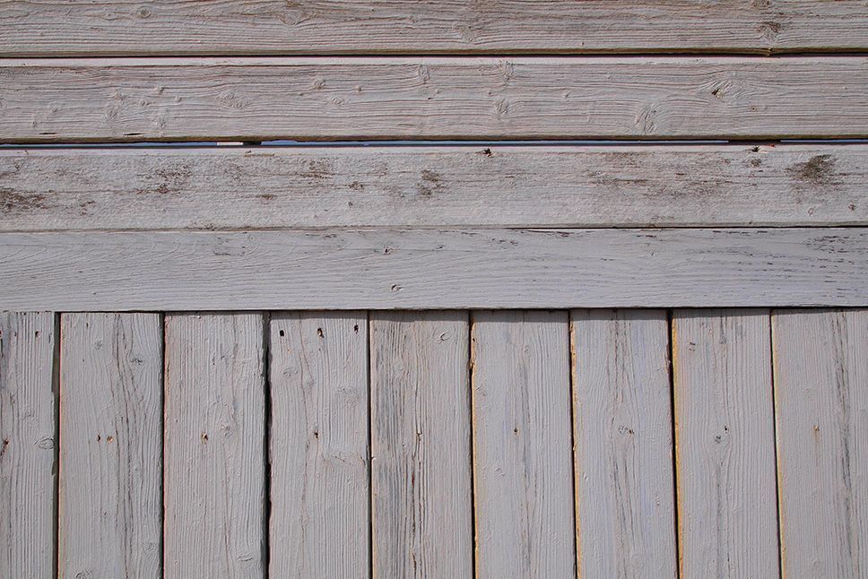 a close-up of wooden fence