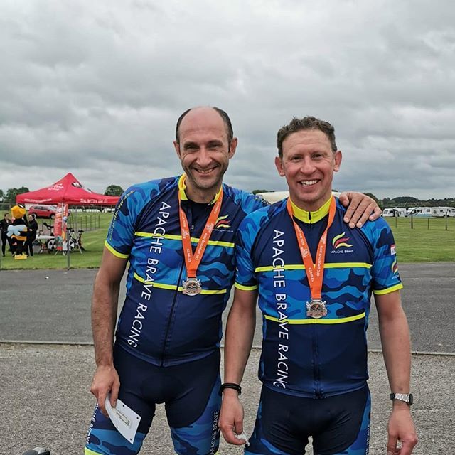 cyclist getting medals at cyclist fighting cancer event