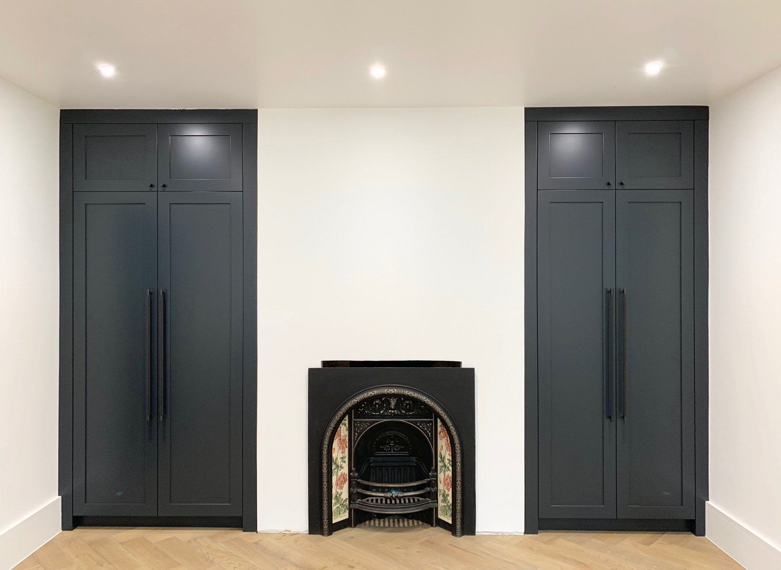 There is a fireplace in the middle of the room.