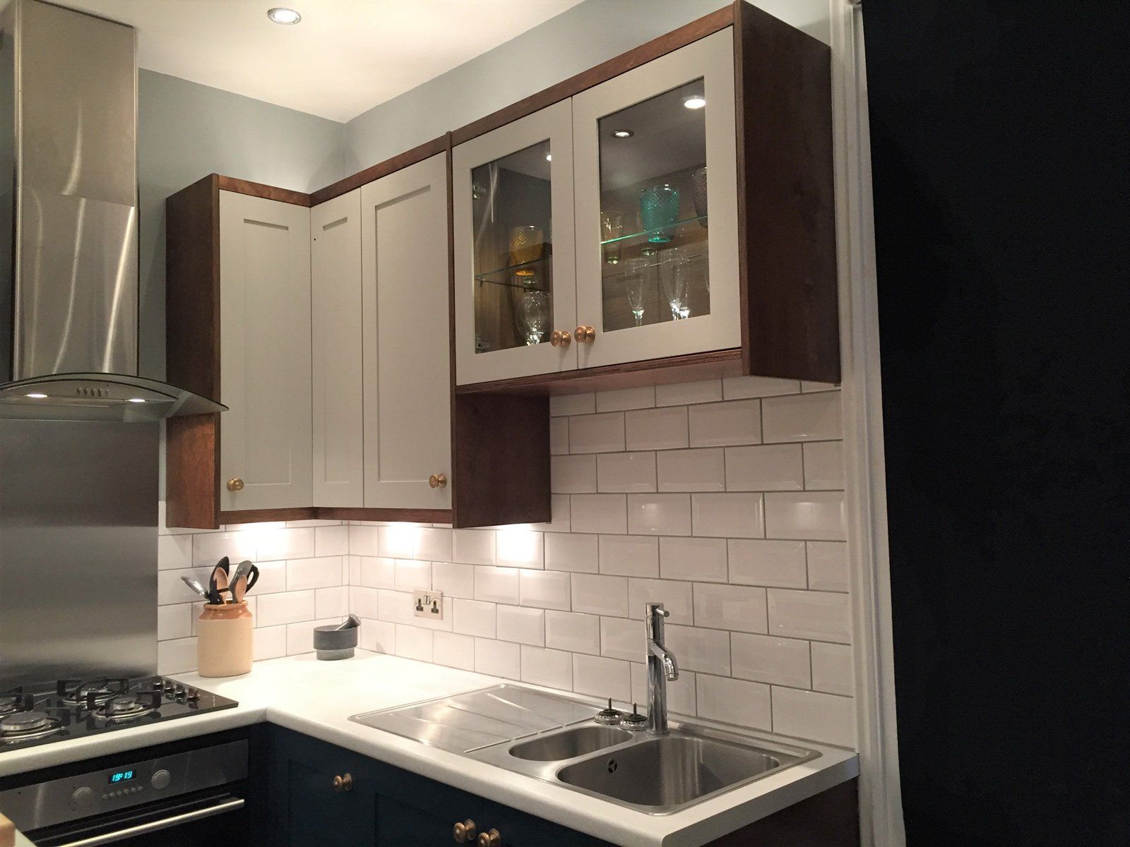 A kitchen with stainless steel appliances and a sink